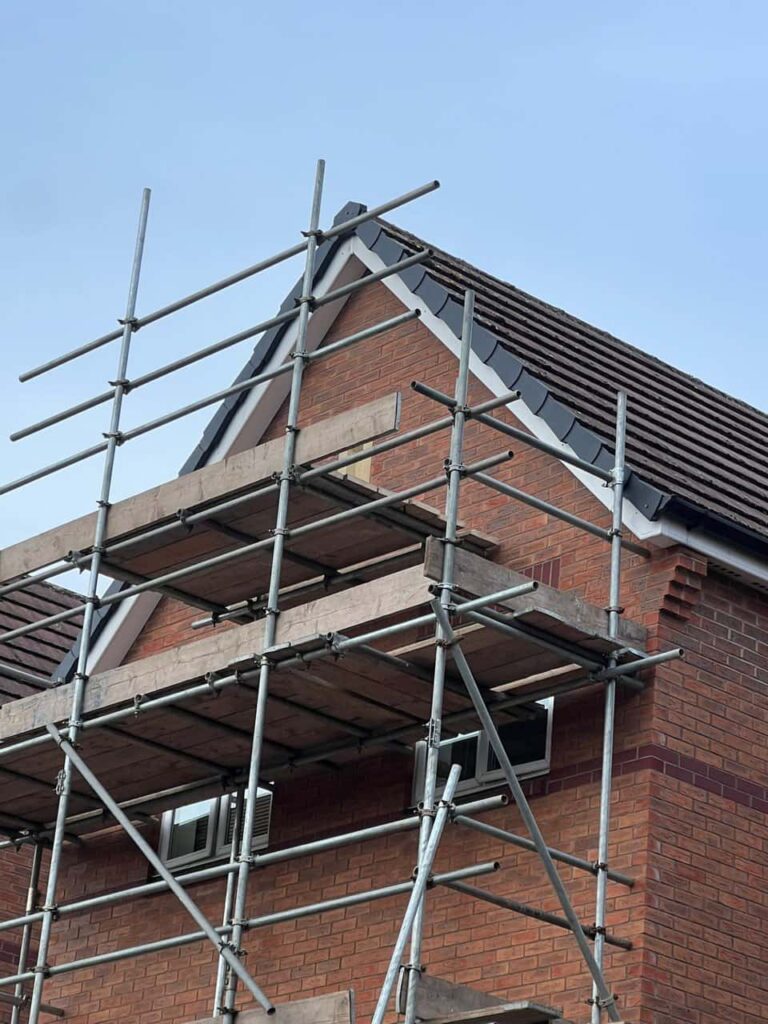 This is a photo of a roof which has just been repaired. There is a scaffold located at the gable end for access onto the roof. Works carried out by TRP Roofing Willerby