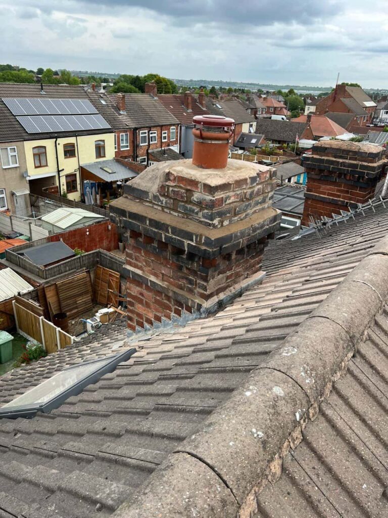 This is a photo taken from a roof which is being repaired by TRP Roofing Willerby it shows a street of houses, and their roofs